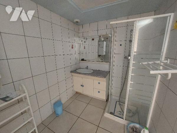 SAINT-GAUDENS, maison de ville sur trois niveaux avec jardin attenant, proche des commerces