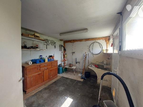 SAINT-GAUDENS, maison de ville sur trois niveaux avec jardin attenant, proche des commerces