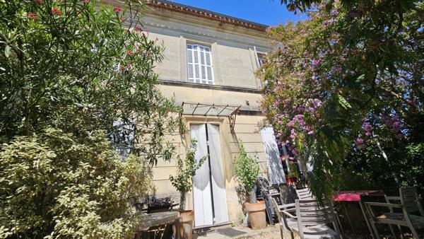 Ensemble immobilier: 1 grande maison pierre et 3 gites