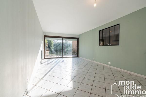 Appartement T4 de plain-pied avec garage et jardin