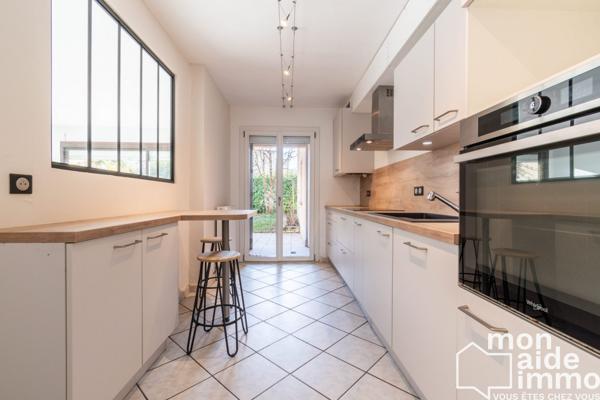 Appartement T4 de plain-pied avec garage et jardin