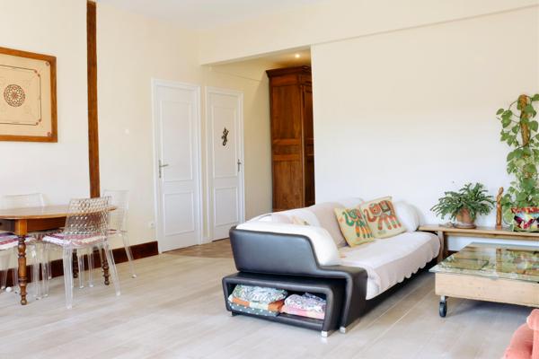 Magnifique appartement ancien 91 m² avec cave et stationnement