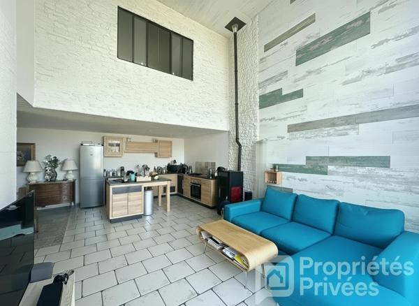 Maison de caractère pierres et bois 145 m²