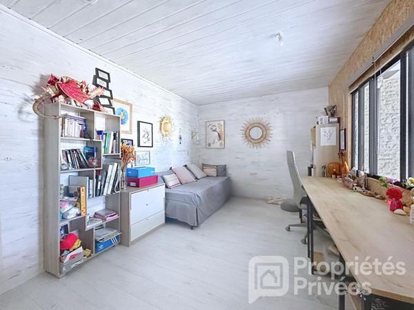 Maison de caractère pierres et bois 145 m²