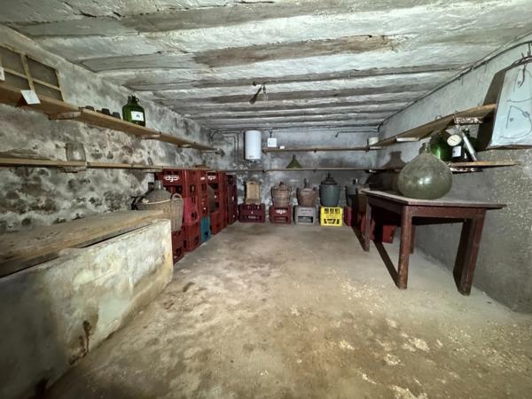 Maison de village de 130 m² avec garage, atelier indépendant et jardin paysager