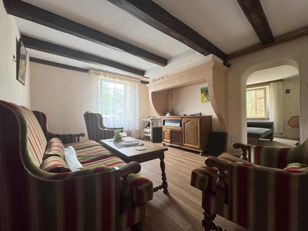 Maison de village de 130 m² avec garage, atelier indépendant et jardin paysager