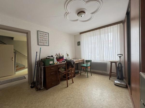 Maison de village de 130 m² avec garage, atelier indépendant et jardin paysager