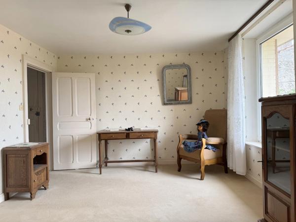 Maison de village de 130 m² avec garage, atelier indépendant et jardin paysager