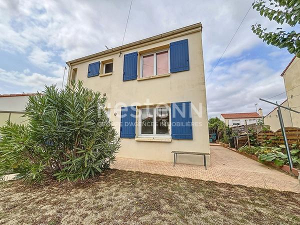 Maison familiale avec véranda, garage et jardin, quartier calme à Fontenay-le-Comte