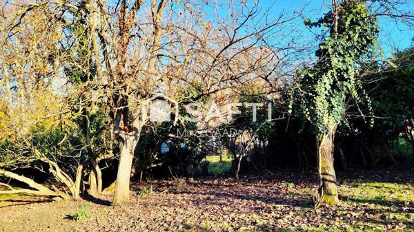 Terrain plat 852m2 proche du centre