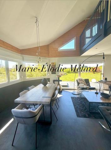 Maison atypique ossature bois 122 m² – Terrain 11,45 ares – Vue dégagée – Proche Luxembourg