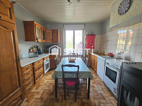 Maison de 3 chambres avec garage et jardin
