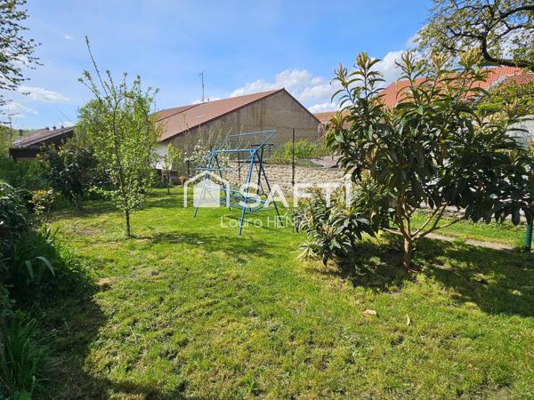 Maison de 3 chambres avec garage et jardin