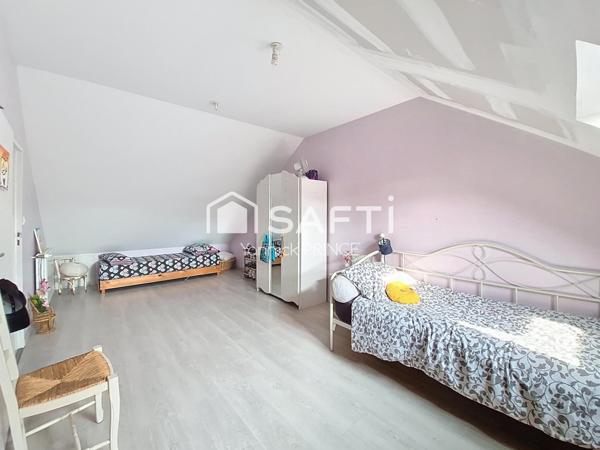 Maison familiale avec T2( 48m2)et garage de 100m2