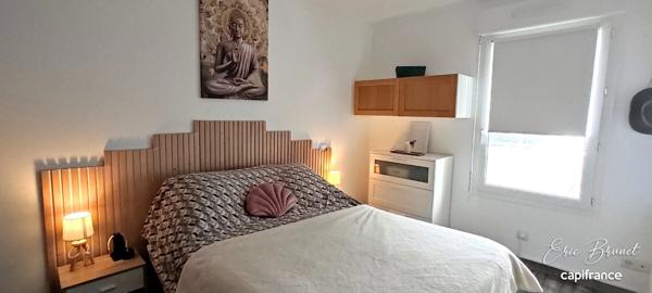 MARCHEPRIME – BEL APPARTEMENT 3 PIÈCES / 2 CHAMBRES AVEC GRAND BALCON