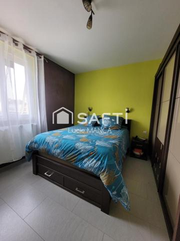 Maison avec garage et terrain constructible