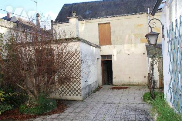 Immeuble centre ville  avec habitation principale et deux appartements.