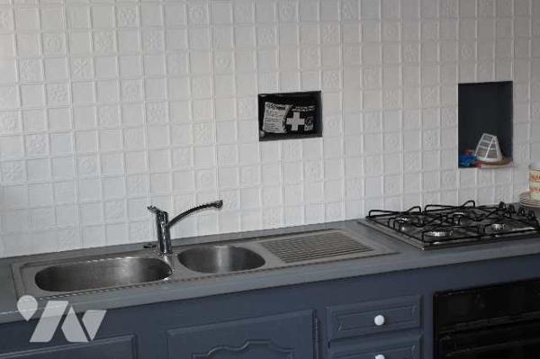 Immeuble centre ville  avec habitation principale et deux appartements.