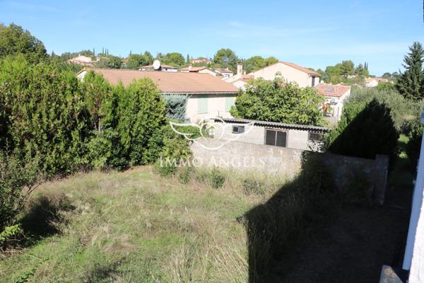 Maison 6 pièces avec grand garage et potentiel d’aménagement