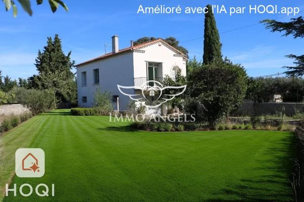 Maison 6 pièces avec grand garage et potentiel d’aménagement