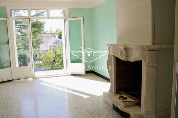 Maison 6 pièces avec grand garage et potentiel d’aménagement