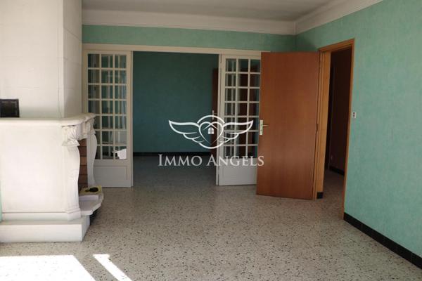 Maison 6 pièces avec grand garage et potentiel d’aménagement