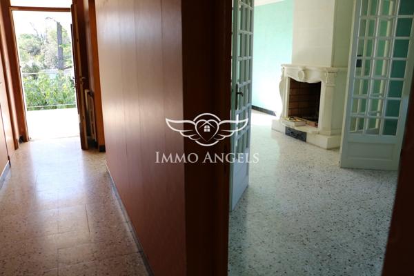 Maison 6 pièces avec grand garage et potentiel d’aménagement