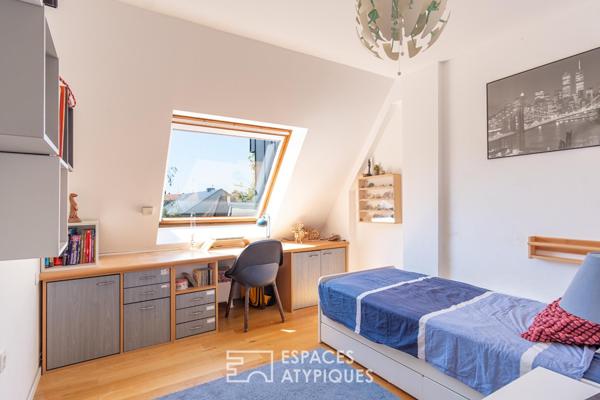 Appartement contemporain en dernier étage avec terrasse au coeur de Neudorf
