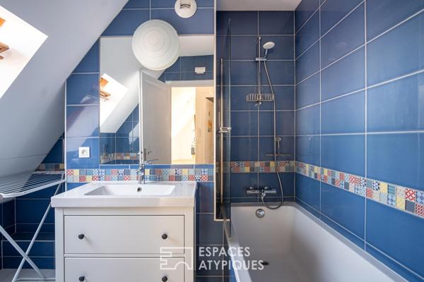 Appartement contemporain en dernier étage avec terrasse au coeur de Neudorf