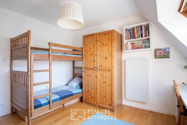 Appartement contemporain en dernier étage avec terrasse au coeur de Neudorf