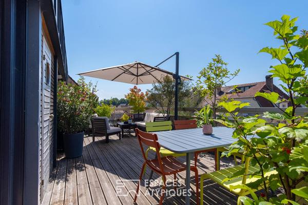 Appartement contemporain en dernier étage avec terrasse au coeur de Neudorf