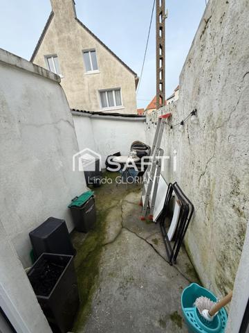 Maison de 68 m2 : 2 chambres / cour / cave