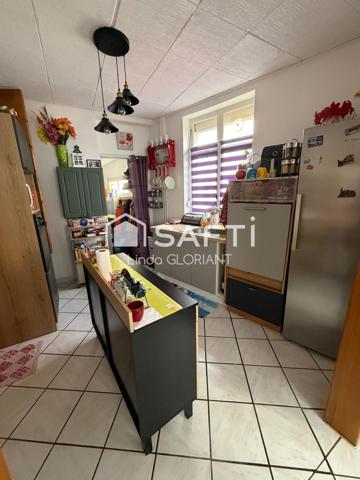 Maison de 68 m2 : 2 chambres / cour / cave