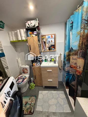 Maison de 68 m2 : 2 chambres / cour / cave