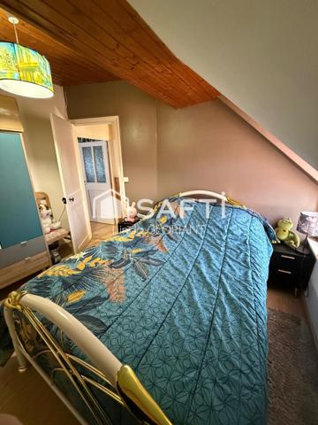 Maison de 68 m2 : 2 chambres / cour / cave