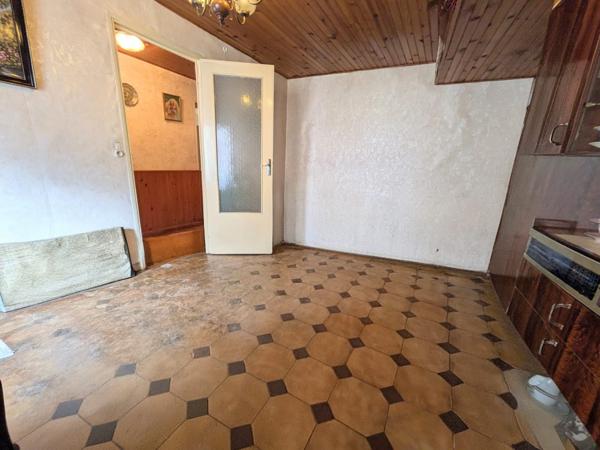 Luzarches - Maison de ville avec jardin, garage et fort potentiel