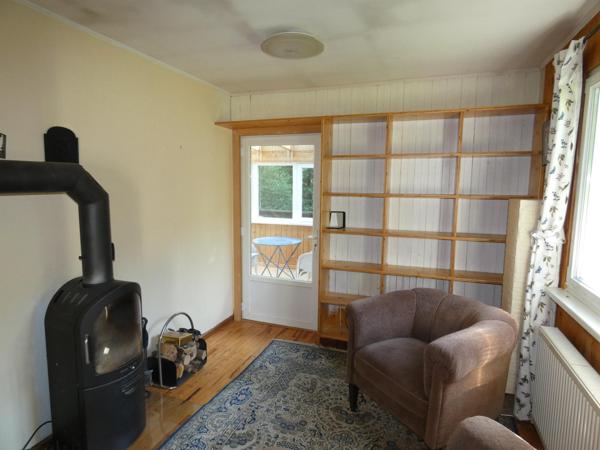 Chalet avec un grand terrain et un étang