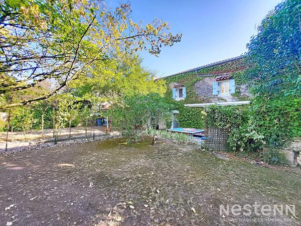 A Vendre Maison en pierre rénovée de 180 m² avec garage et jardin au centre de Valence-sur-Baïse