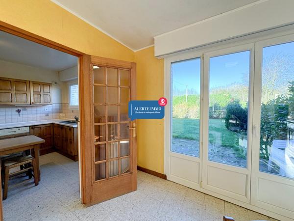 Maison semi-individuelle de 97 m2 comprenant 3 ch + 1 poss, jardin et garage attenant