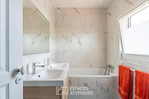 Maison transformée esprit loft avec terrasse et jardin