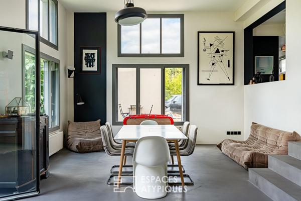 Maison transformée esprit loft avec terrasse et jardin
