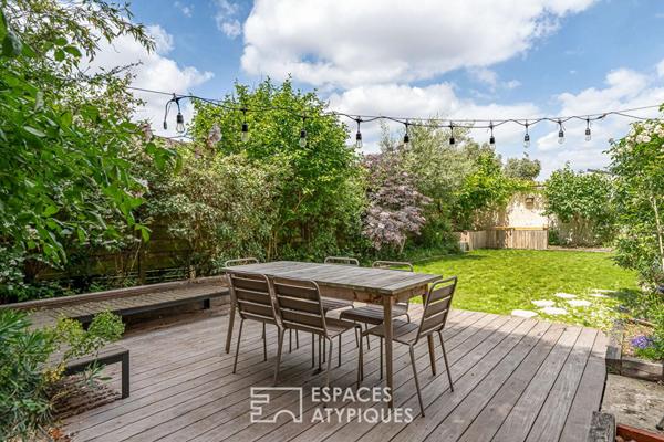 Maison transformée esprit loft avec terrasse et jardin