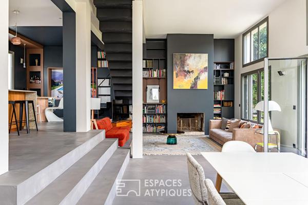 Maison transformée esprit loft avec terrasse et jardin