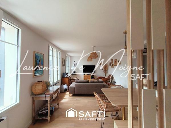 Magnifique appartement entièrement repensé, à proximité immédiate du centre ville.