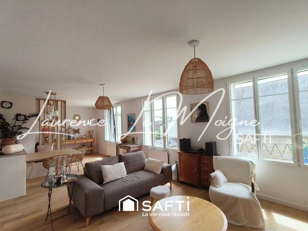 Magnifique appartement entièrement repensé, à proximité immédiate du centre ville.