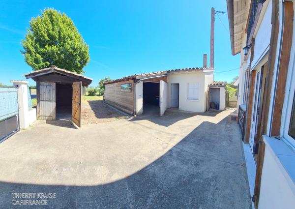 Saint Porquier, maison composé de deux logements, cinq chambres, 252 m², jardin, garages, atelier, entièrement rénové.