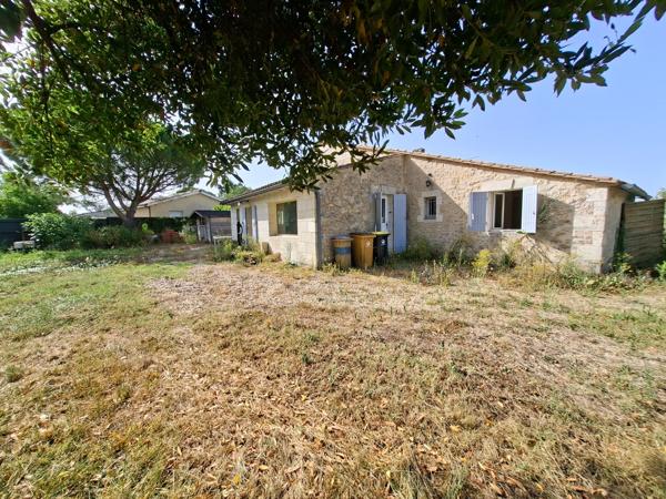 Ensemble de 2 maisons et d'un terrain à bâtir.
