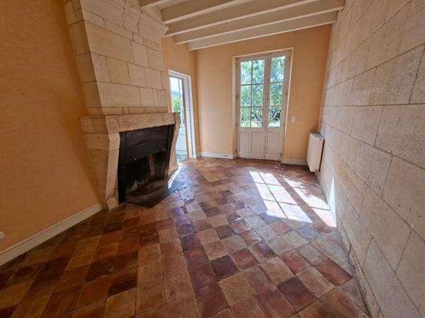Ensemble de 2 maisons et d'un terrain à bâtir.