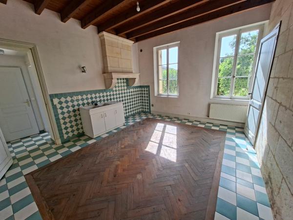 Ensemble de 2 maisons et d'un terrain à bâtir.