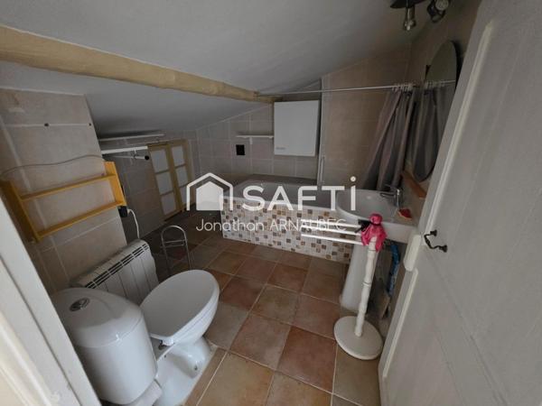 Maison familiale avec terrasse, véranda et potentiel locatif